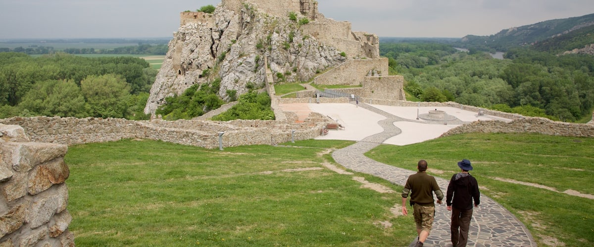 Devin Castle featuring heritage elements and building ruins as well as a couple