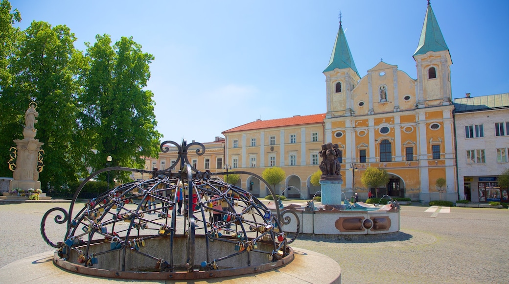 Marianske Namestie which includes a fountain and a square or plaza