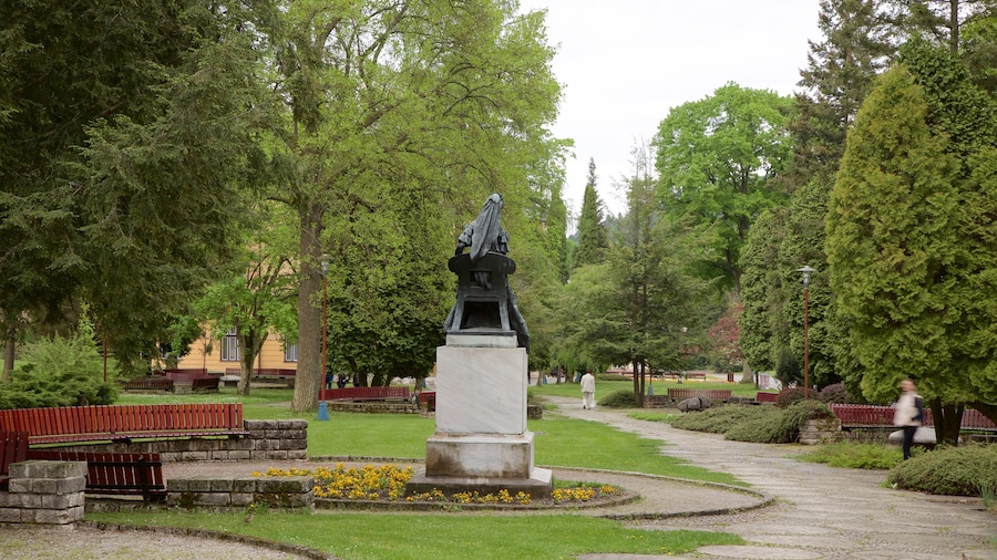 Bardejov which includes a garden and a statue or sculpture