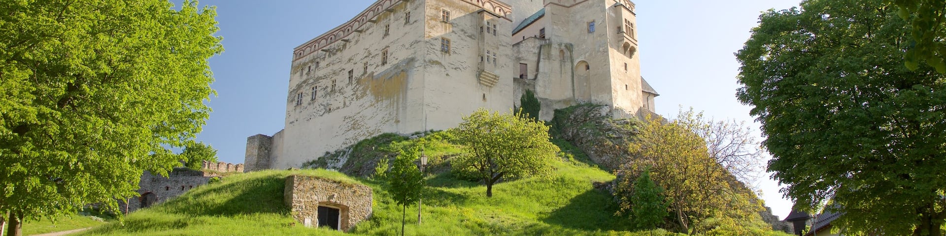 Slovakia showing chateau or palace, heritage elements and a garden