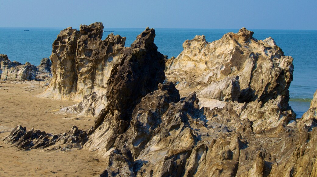 Vagator Beach showing rugged coastline