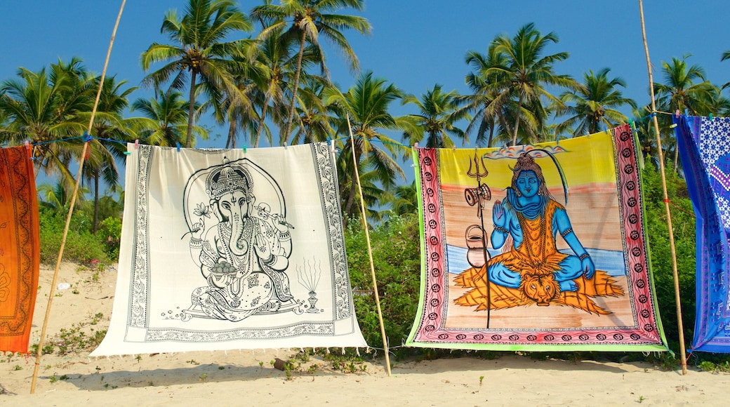 Mandrem Beach showing tropical scenes and a beach