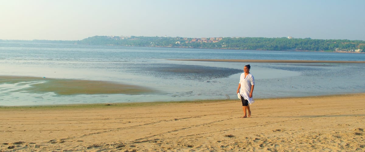 Miramar Beach which includes a sandy beach and general coastal views as well as an individual femail