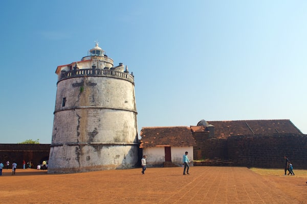 Candolim Beach - Fort Aguada featuring farmland, a lighthouse and tranquil scenes