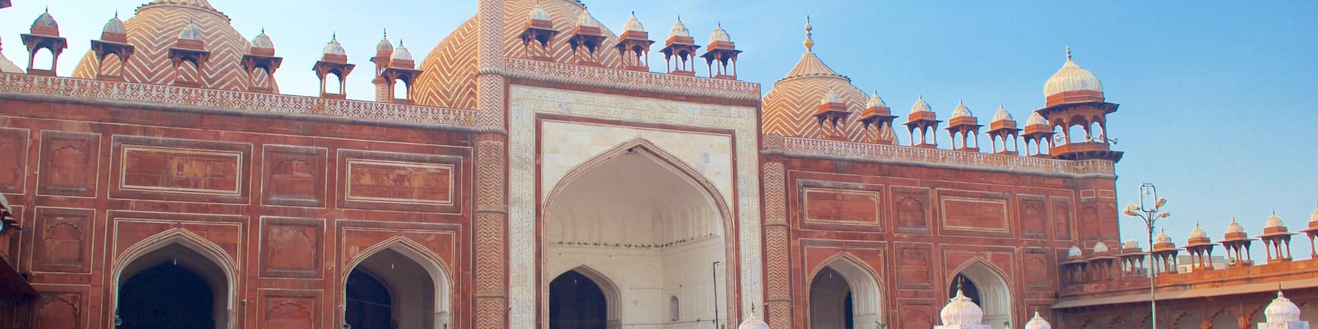 Jama Masjid featuring a square or plaza and a mosque