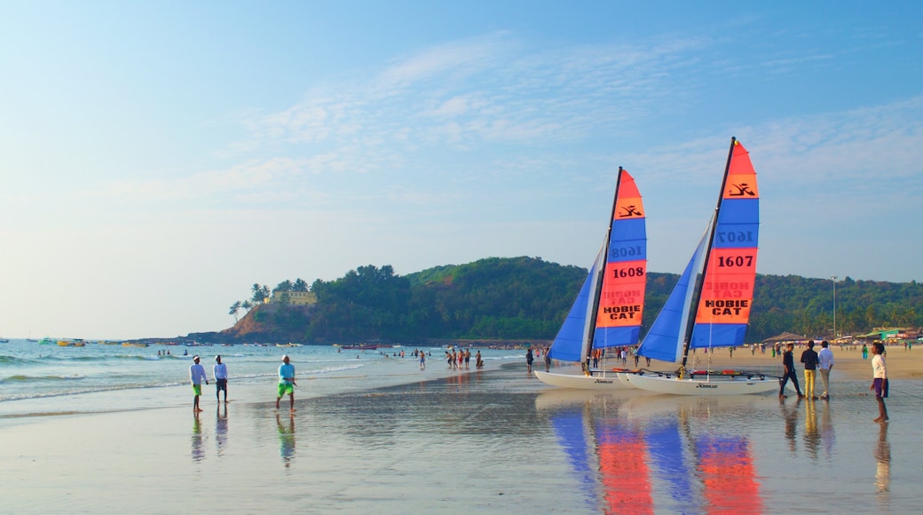 Baga Beach which includes general coastal views, sailing and a sandy beach