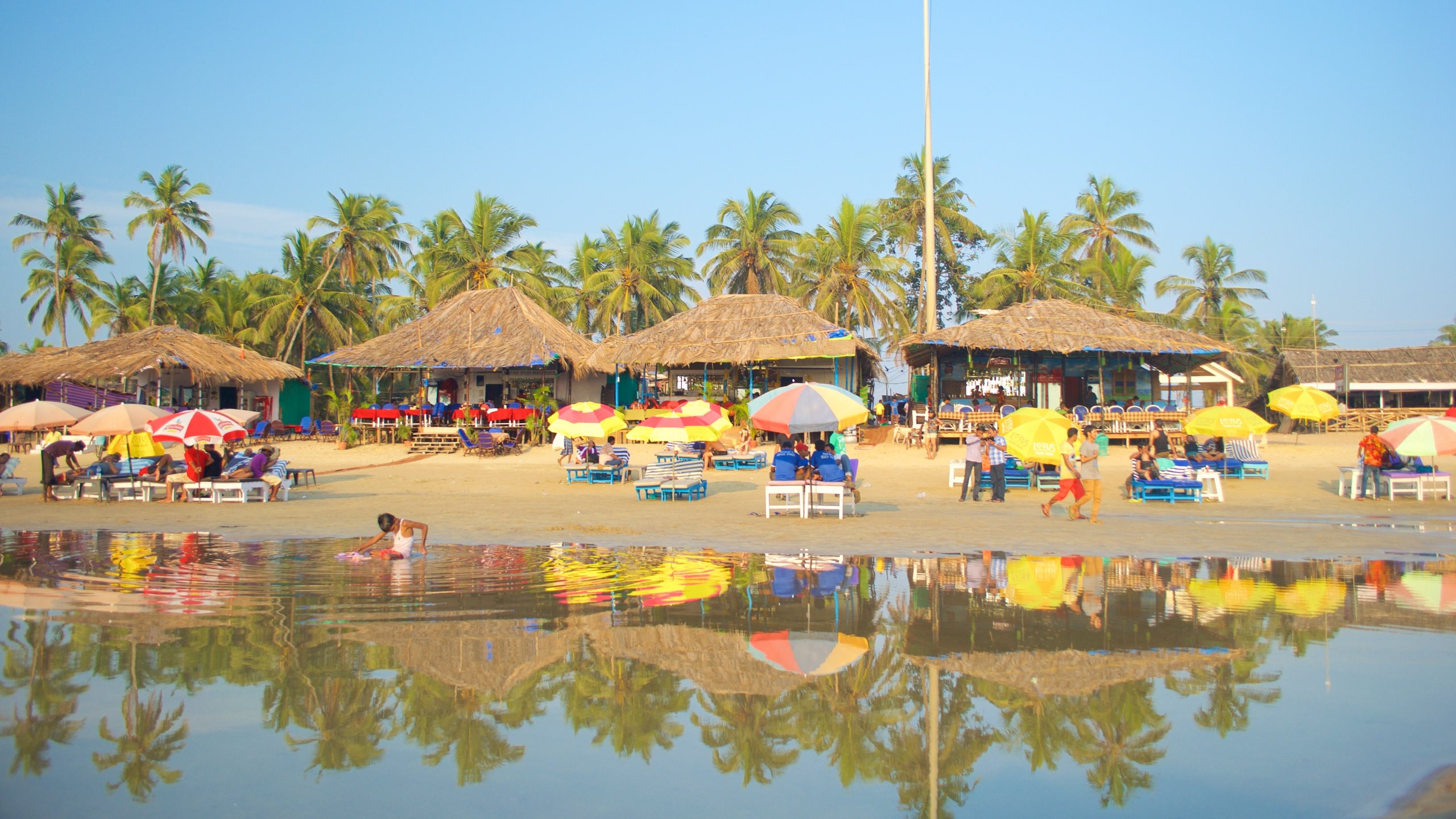 Baga Beach featuring a beach, a beach bar and general coastal views