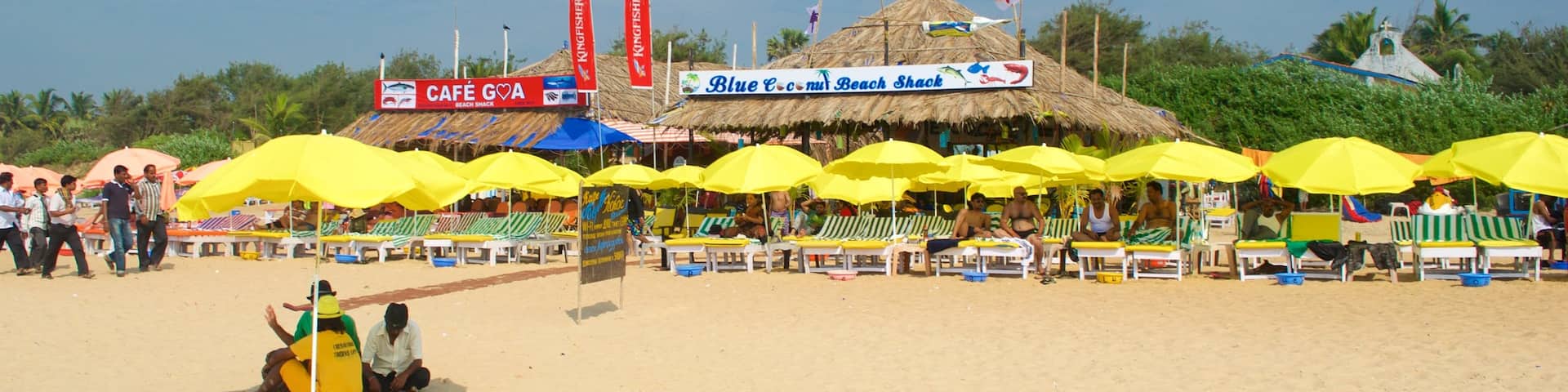 Calangute Beach which includes a sandy beach and a beach bar