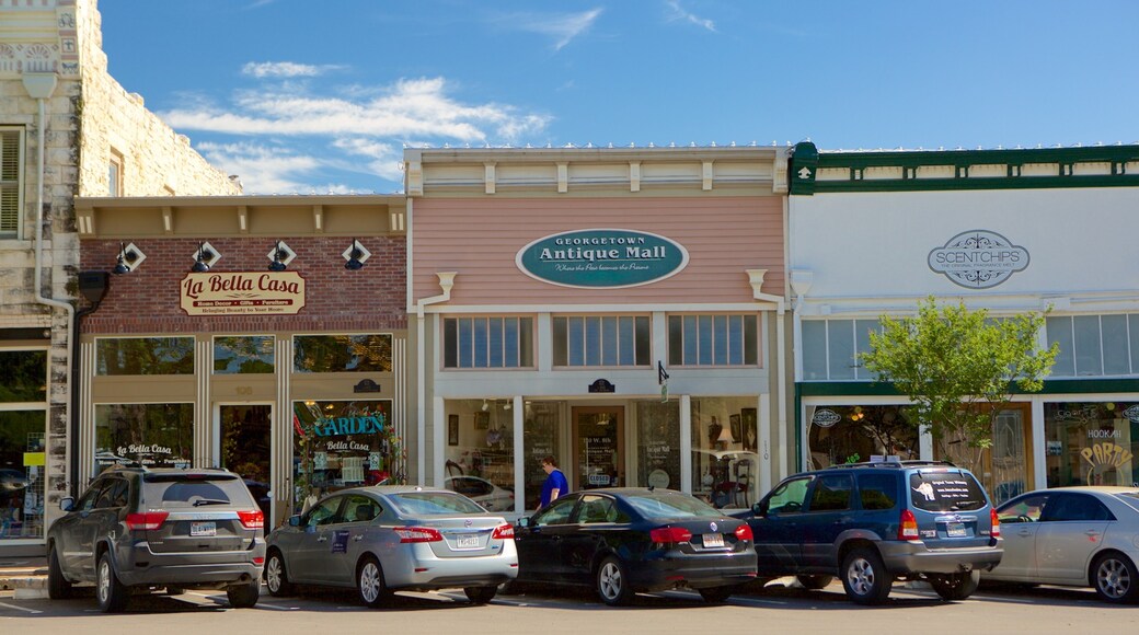 Georgetown which includes a small town or village, signage and shopping