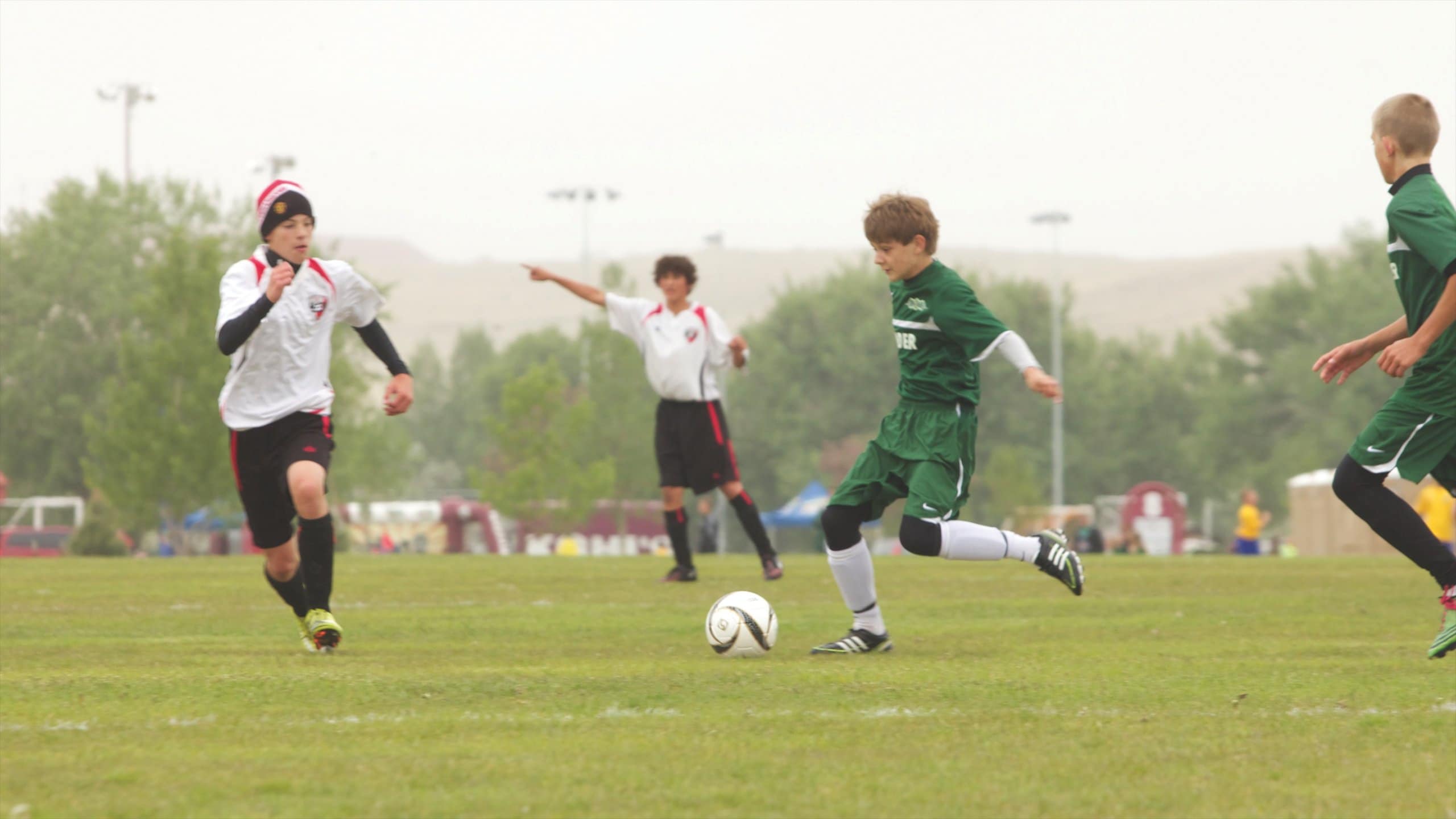 Casper featuring a sporting event as well as children