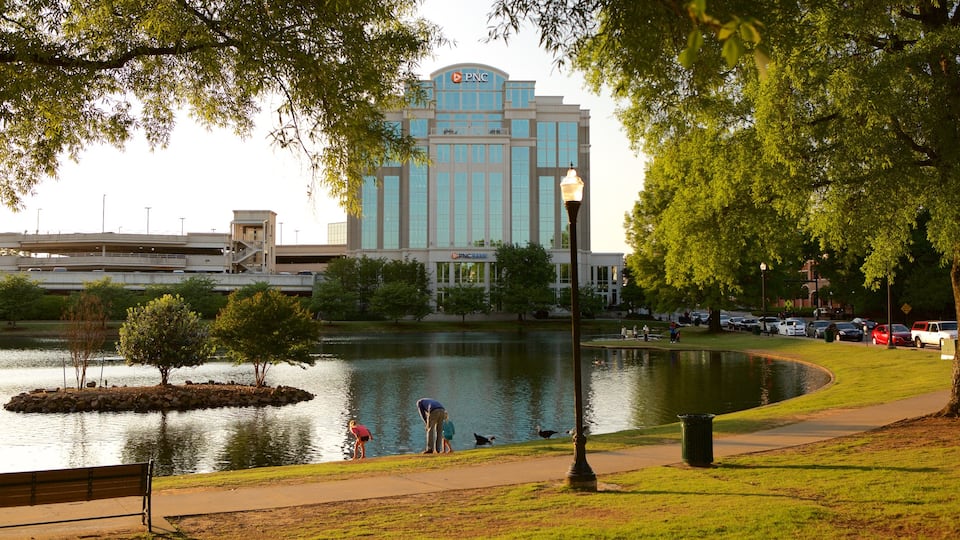 Huntsville featuring a pond and a park