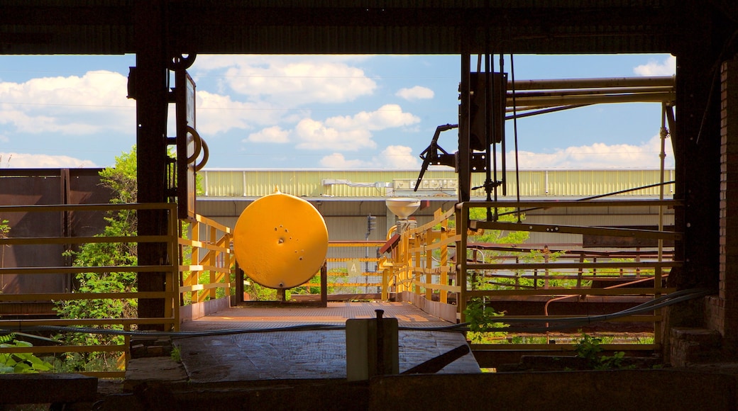 Sloss Furnaces which includes interior views and industrial elements