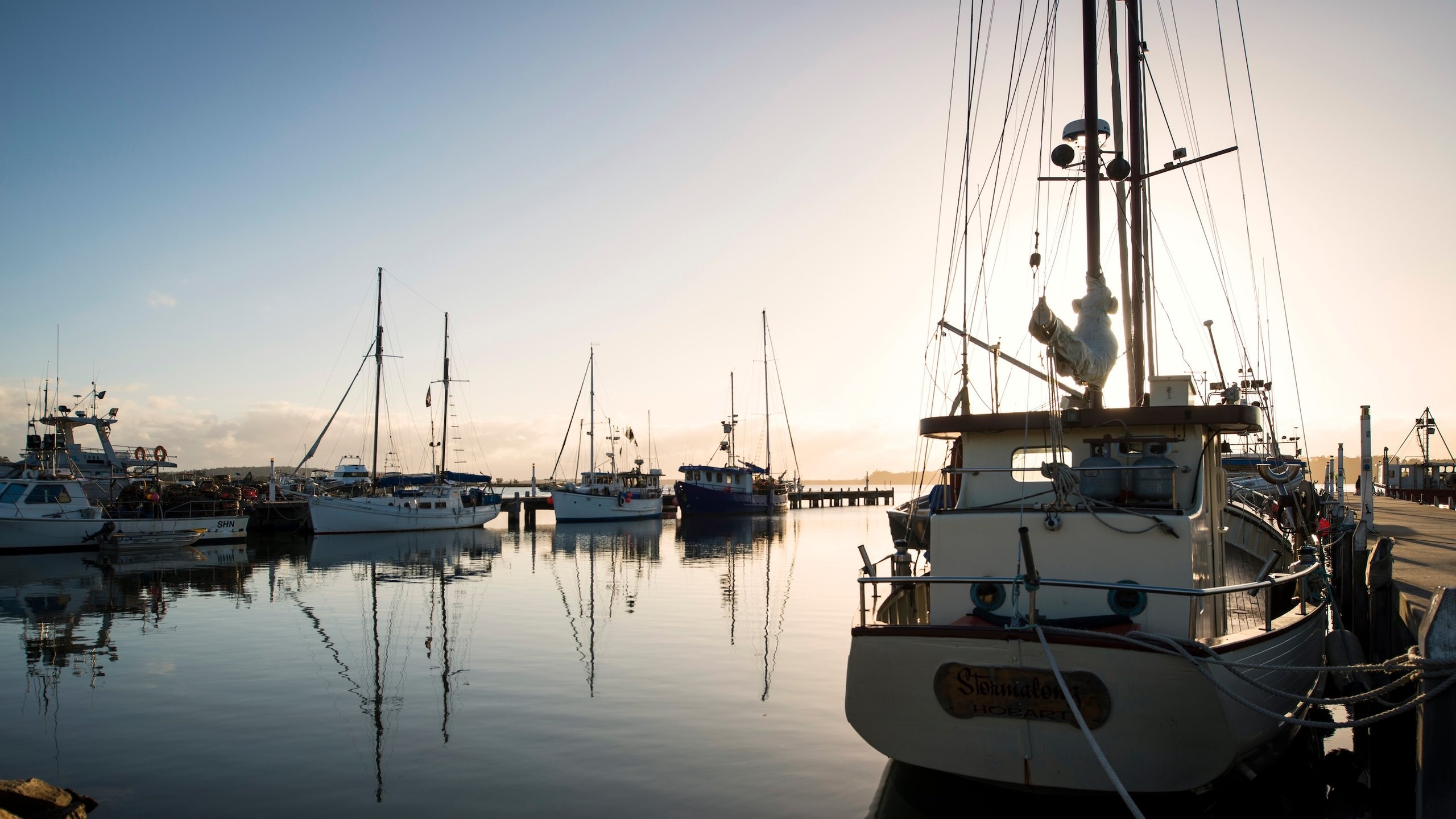 St Helens showing boating, a bay or harbor and a sunset