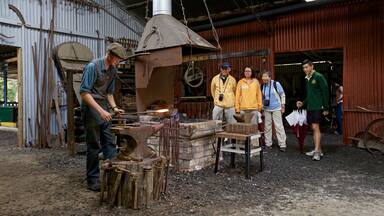 Zeehan showing interior views as well as a small group of people