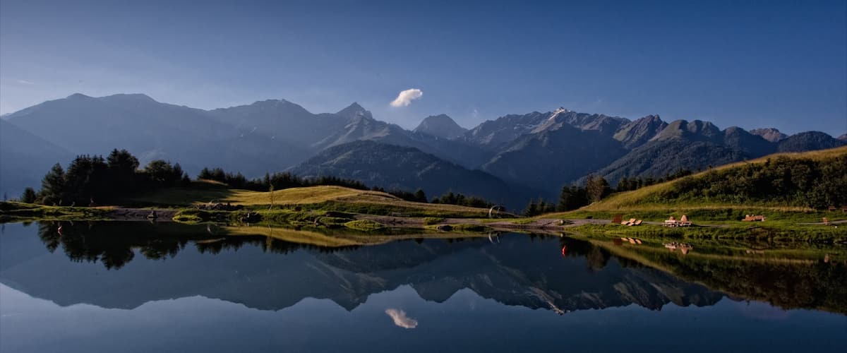 Serfaus which includes a lake or waterhole and mountains