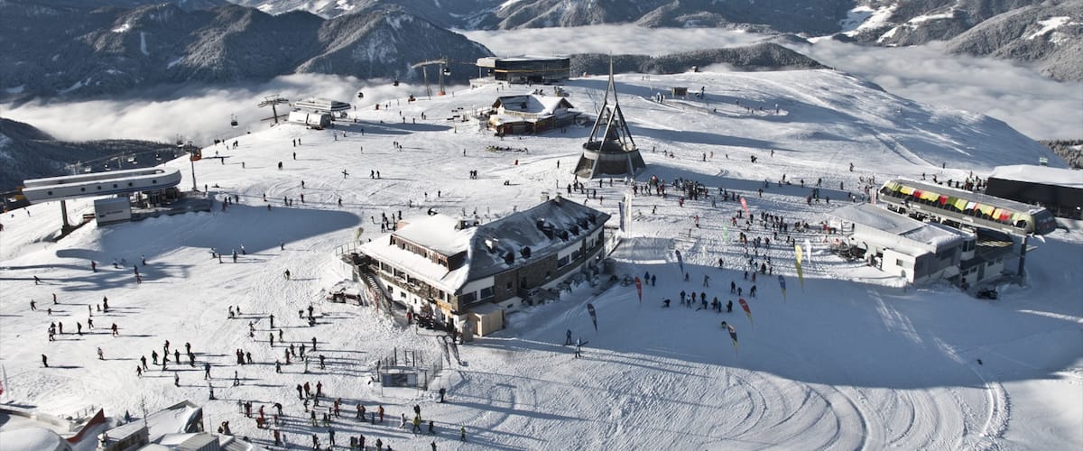 Kronplatz Ski Area featuring a luxury hotel or resort, snow and landscape views
