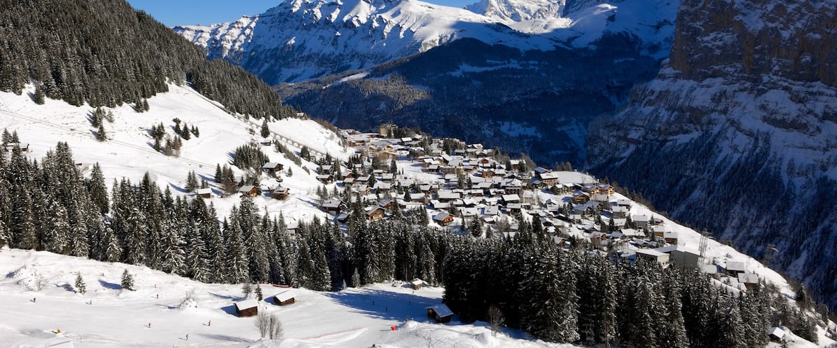 Muerren which includes mountains, snow and a small town or village