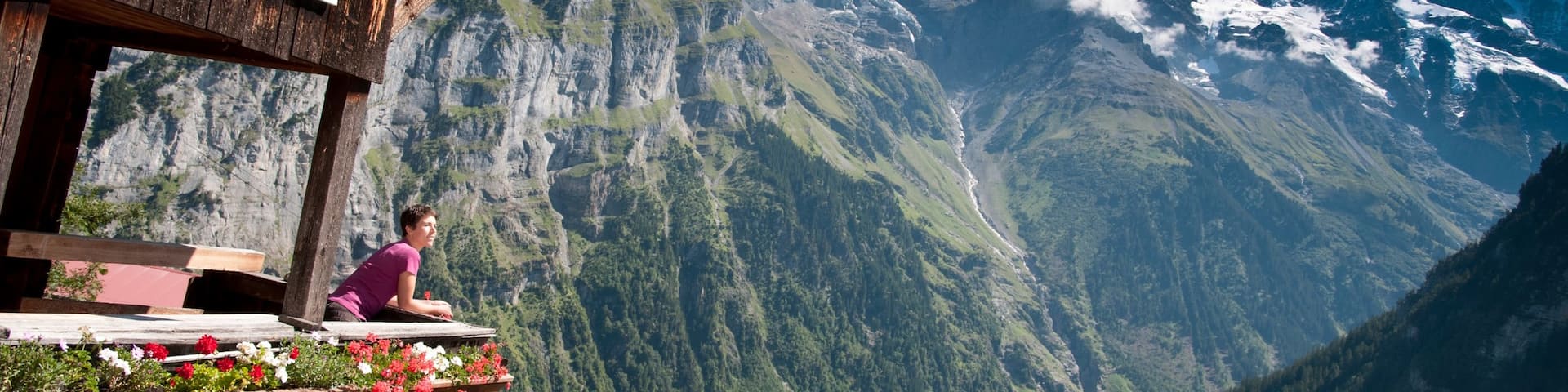 Bernese Alps showing mountains as well as an individual female