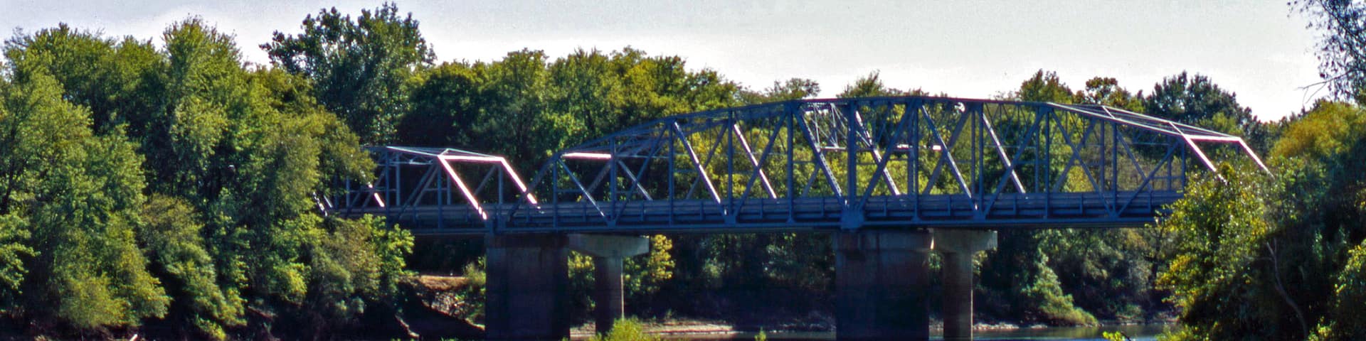 Pocahontas featuring a bridge and a river or creek as well as a couple