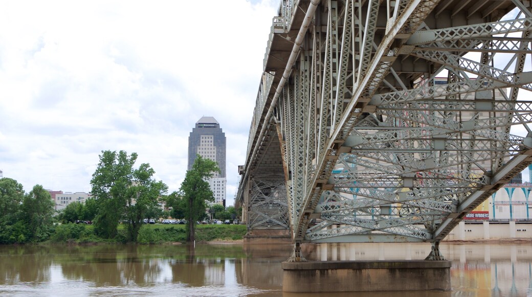 Louisiana Boardwalk which includes a bridge and a river or creek