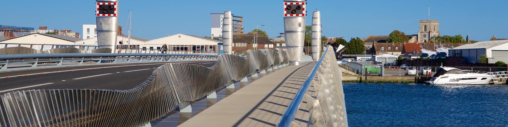 Poole featuring a bridge, a river or creek and modern architecture