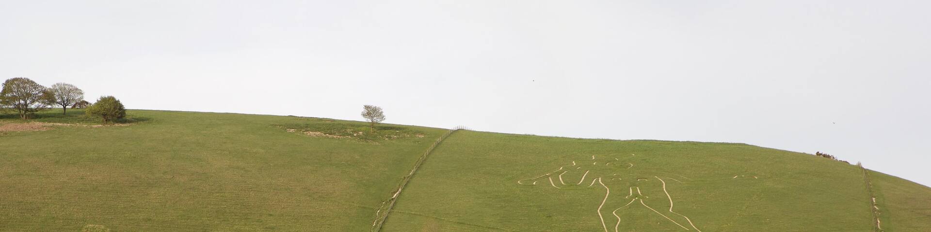 Cerne Abbas Giant which includes tranquil scenes and outdoor art