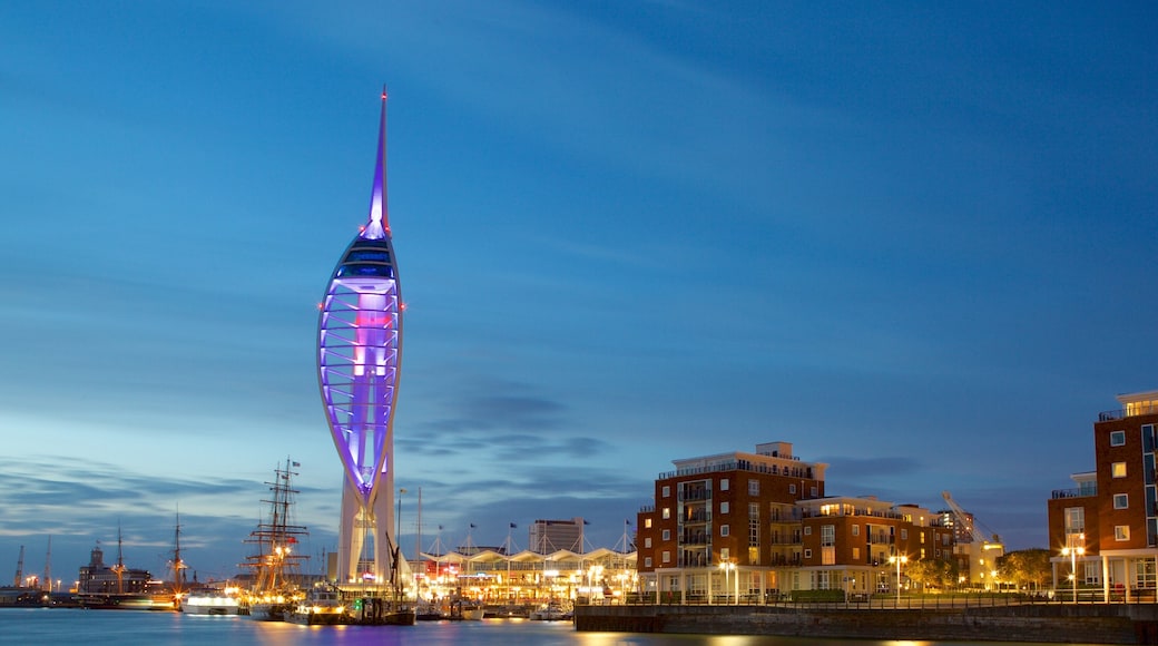 Spinnaker Tower which includes a bay or harbor and modern architecture