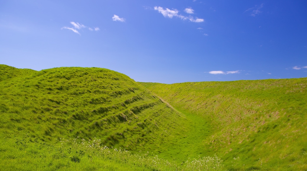 Maiden Castle which includes tranquil scenes