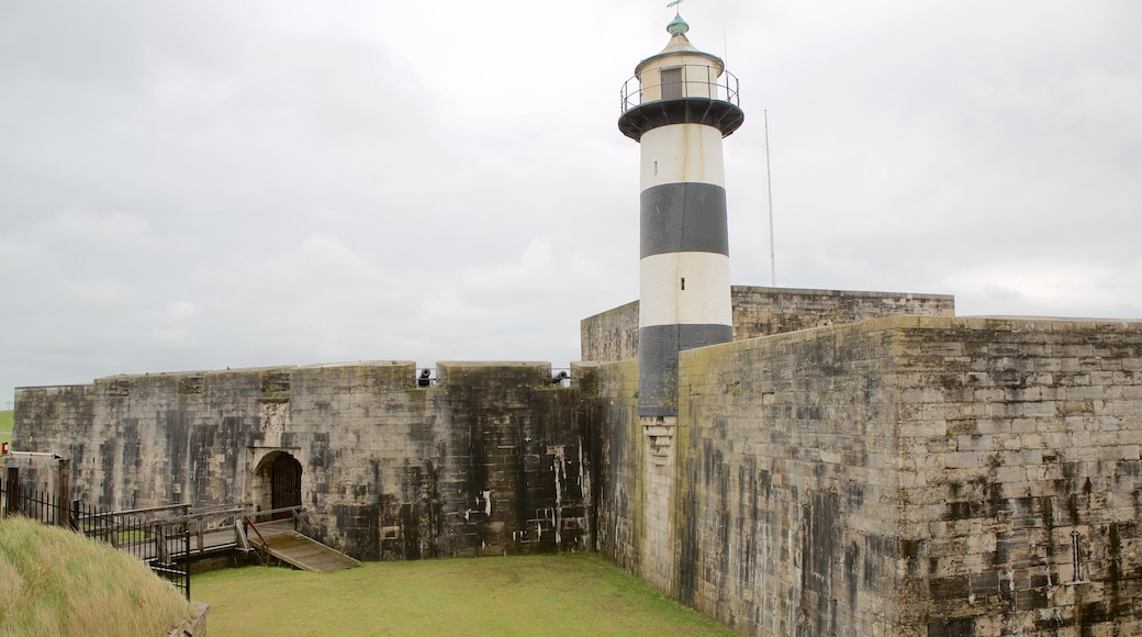 Southsea Castle which includes a lighthouse, heritage elements and château or palace