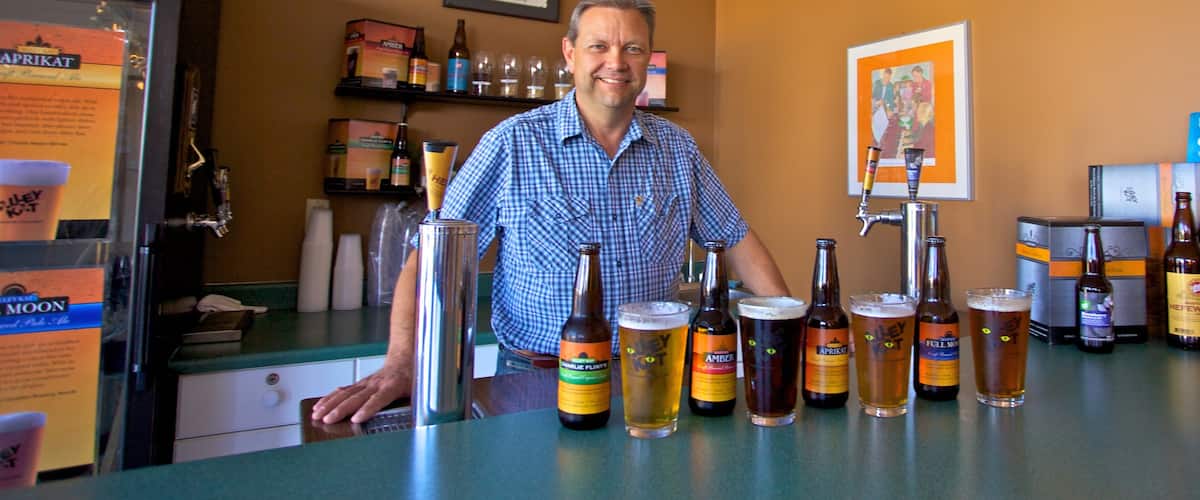 Alley Kat Brewery featuring drinks or beverages as well as an individual male