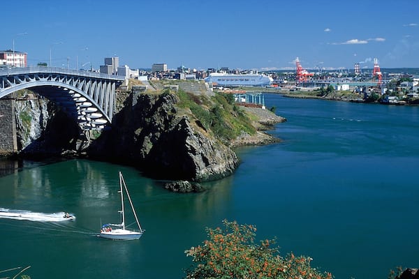 Reversing Falls featuring a bridge and a bay or harbour