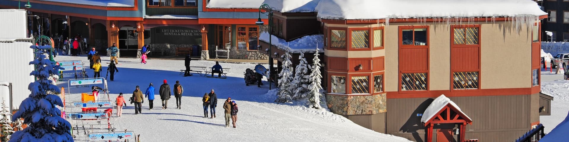 Big White Ski Resort featuring snow as well as a small group of people