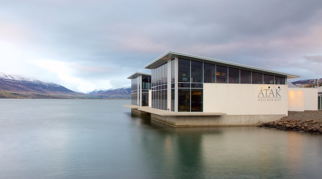 Akureyri which includes modern architecture and general coastal views