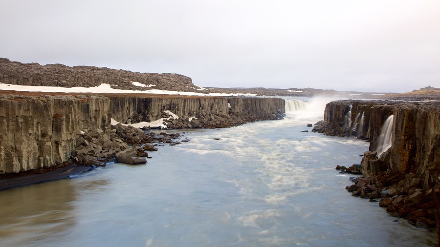 Skinnastadur featuring a river or creek, a gorge or canyon and a cascade