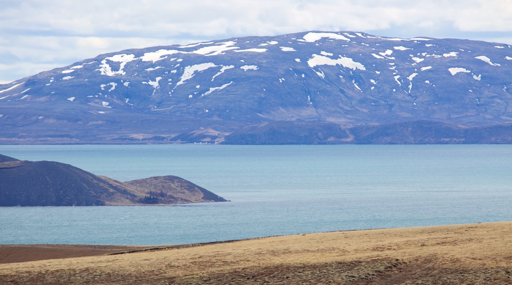 Thingvellir National Park which includes snow, mountains and general coastal views