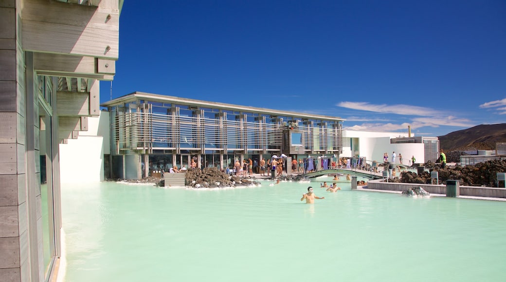 Blue Lagoon which includes a hot spring, a luxury hotel or resort and swimming