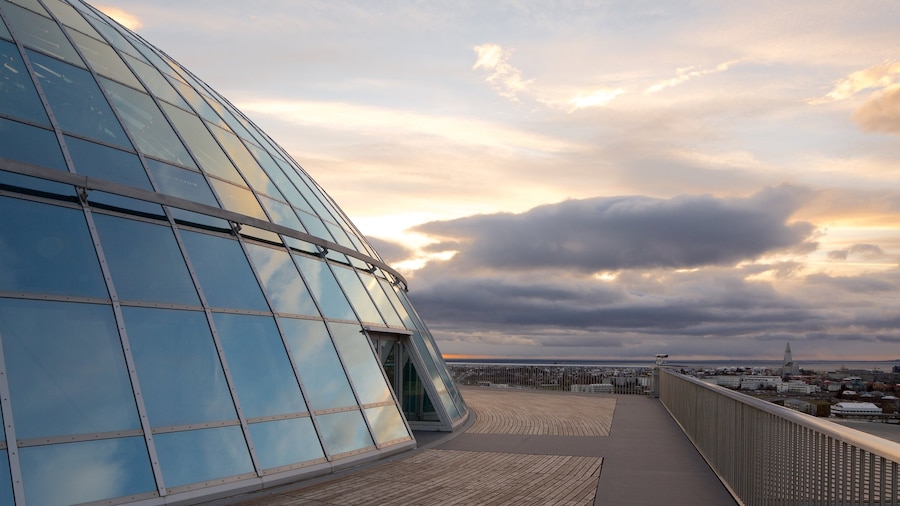 Perlan which includes modern architecture and a sunset