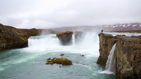 Godafoss showing a cascade and mist or fog