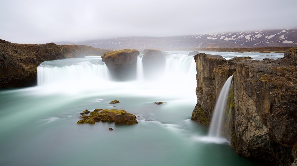 Godafoss showing mist or fog and a cascade
