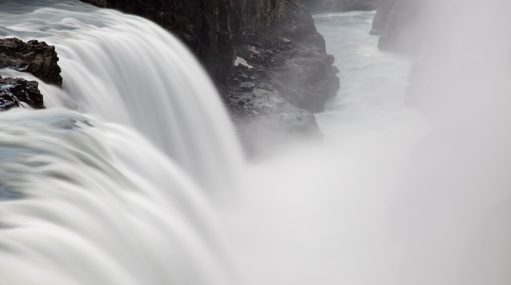 Gullfoss Waterfall showing a cascade and mist or fog