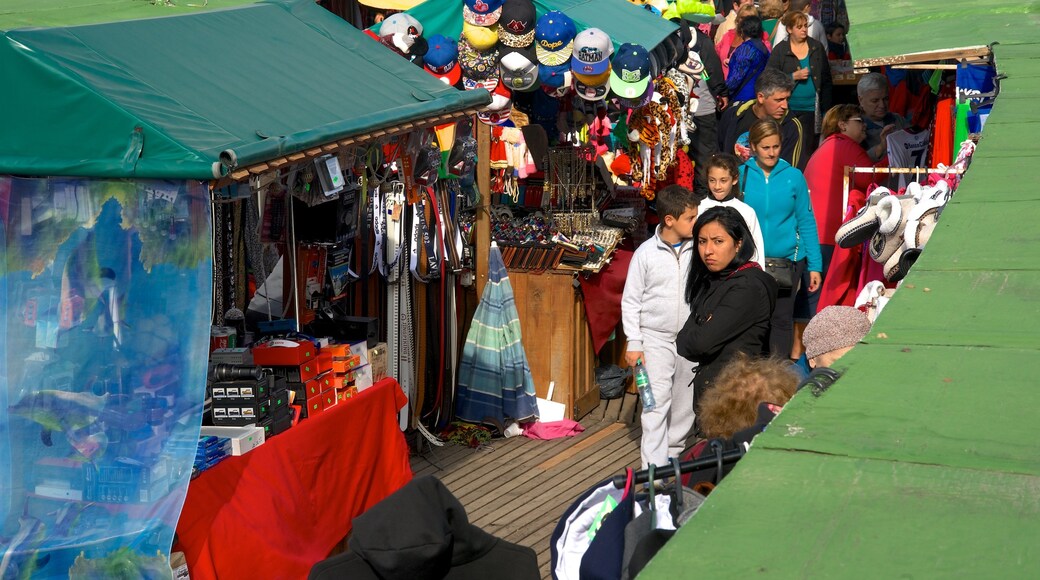 Bristol Beach featuring markets as well as a small group of people