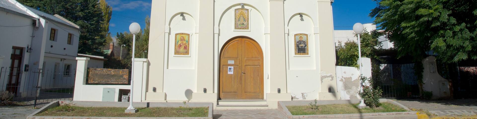 Puerto Madryn which includes a church or cathedral and religious elements