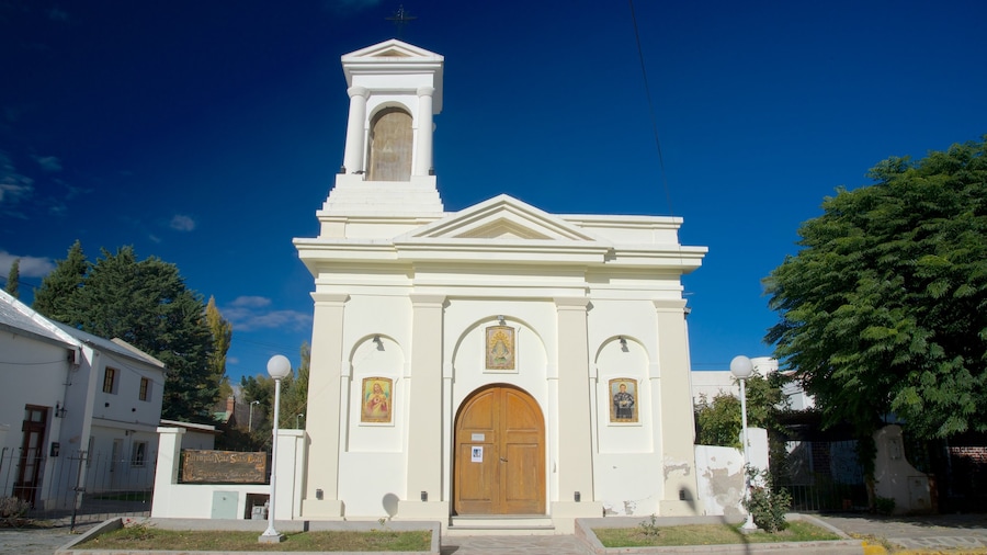 Puerto Madryn which includes a church or cathedral and religious elements