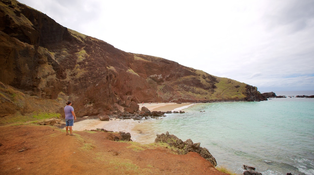 Ovahe Beach showing general coastal views as well as an individual male