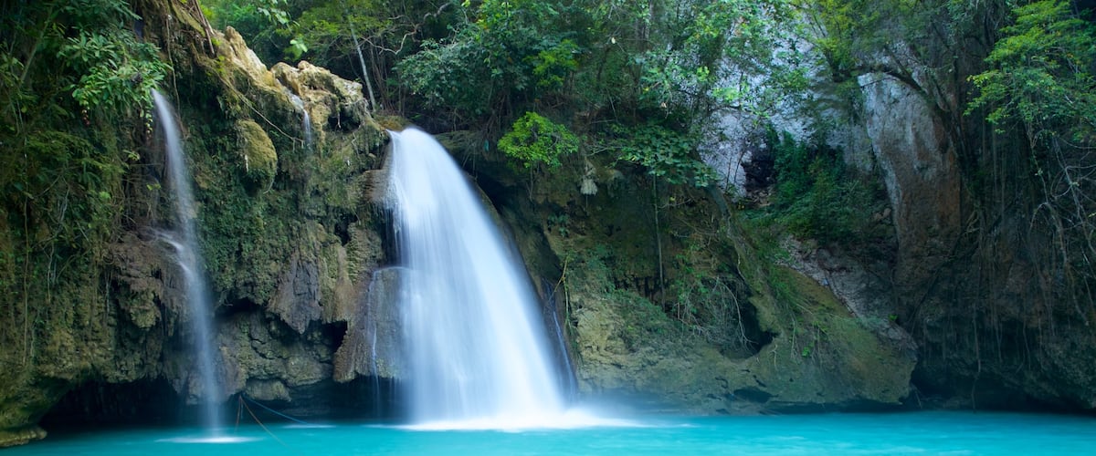 Kawasan Falls showing a waterfall and a river or creek