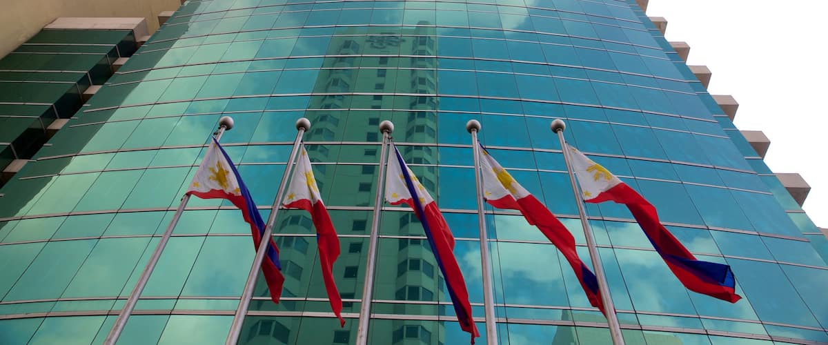 Malate which includes a high rise building and modern architecture