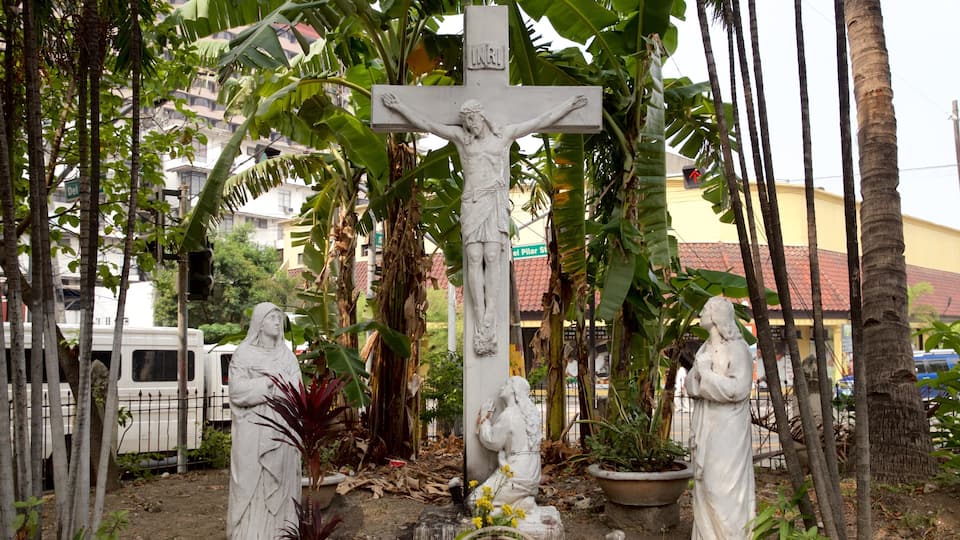 Malate das einen religiöse Elemente und Statue oder Skulptur