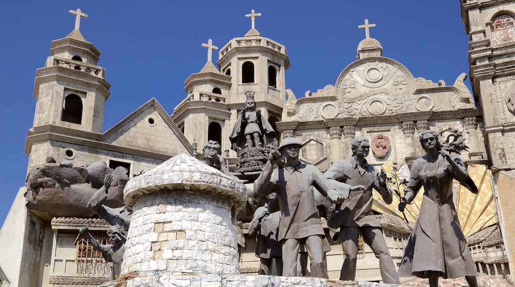 Heritage of Cebu Monument que inclui elementos religiosos, uma estĂĄtua ou escultura e arquitetura de patrimĂŽnio