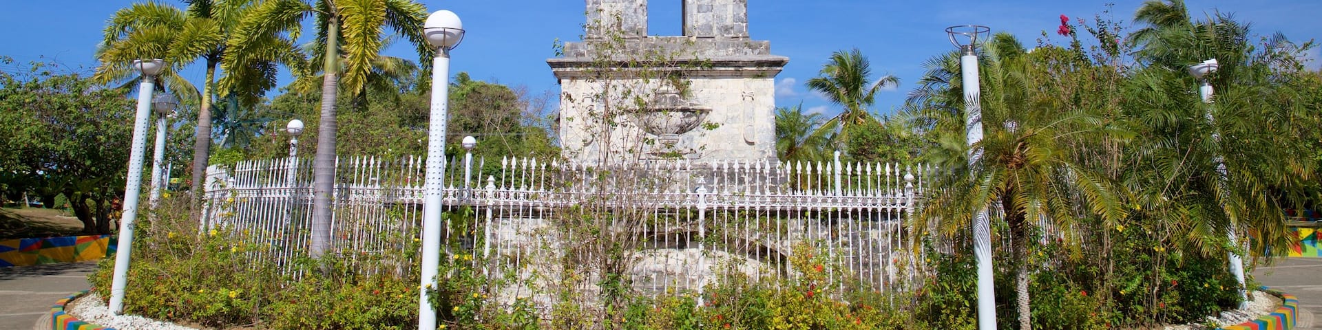 Magellan Shrine showing a garden and a monument
