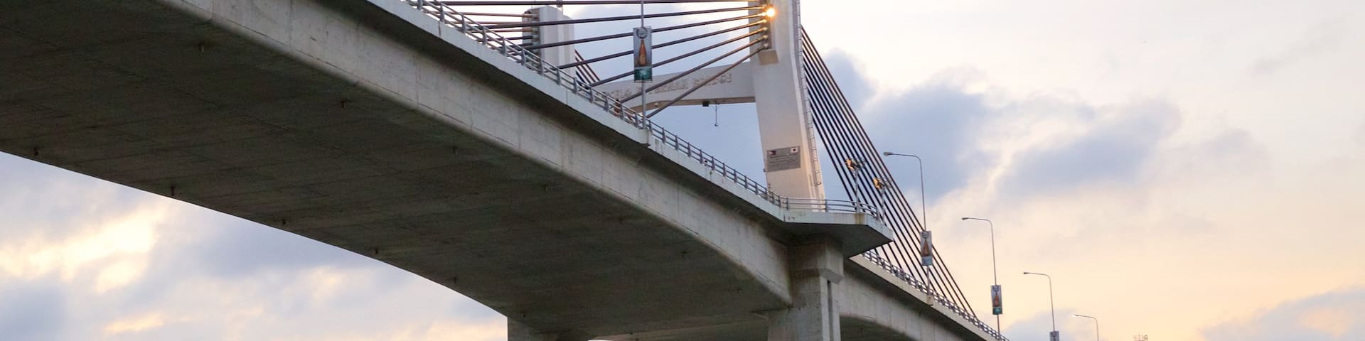Marcelo Fernan Bridge featuring a sunset and a bridge